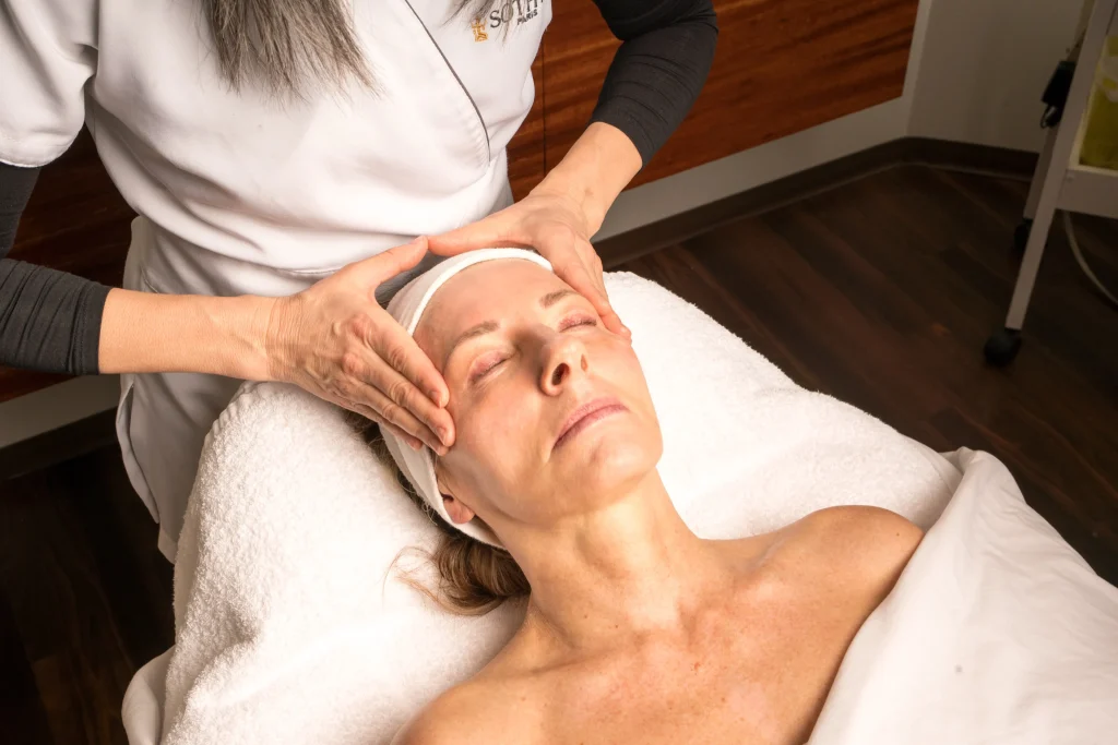 woman receiving a seasonal facial treatment at PURE Esthetics Kelowna
